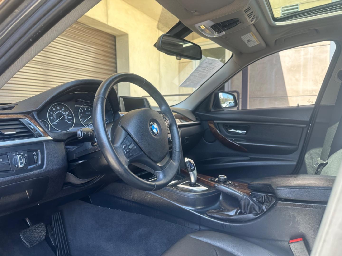 2014 Gray /Black BMW 3-Series leather (WBA3B1C52EK) with an 4 Cylinder engine, Automatic transmission, located at 30 S. Berkeley Avenue, Pasadena, CA, 91107, (626) 248-7567, 34.145447, -118.109398 - Moon-roof! Premium package! this 2014 BMW 3-Series 320i Sedan looks and drives well. Looking for a reliable and stylish vehicle in Pasadena, CA? Look no further! We have this sleek 2014 BMW 3-Series 320i Sedan available at our dealership. Whether you have perfect credit or are concerned about your c - Photo#9